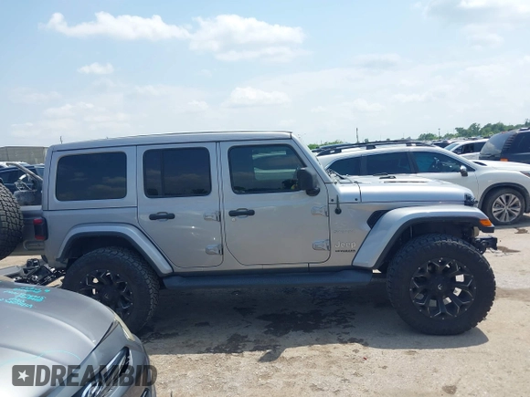 2021 Jeep Wrangler Unlimited High Altitude with VIN 1C4HJXEG3MW511185, listed as a IAAI auction lot 42125883 with 45,564 mi miles and . Bid and sale history available at DreamBid. Image 13.