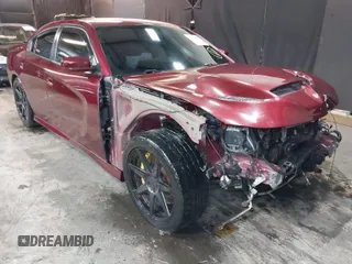2019 Dodge Charger SRT Hellcat with VIN 2C3CDXL92KH693077, listed as a IAAI auction lot 39361432 with 57,522 mi miles and . Bid and sale history available at carsss.com. Image 1.