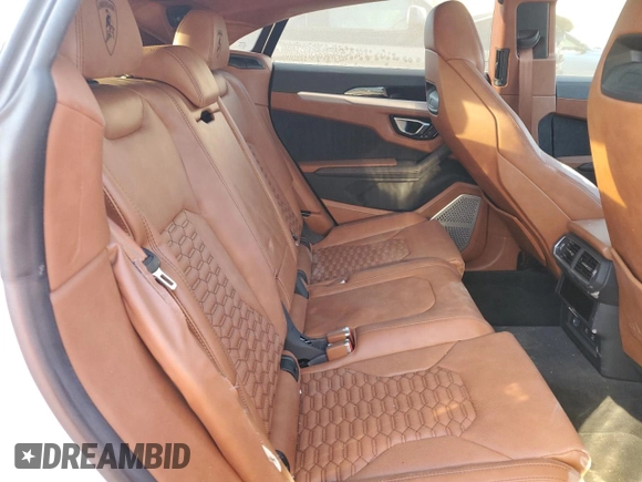 2022 Lamborghini Urus z VIN ZPBUA1ZL8NLA22604, wystawiony jako Copart lot #77174164 z przebiegiem Nie podano mil oraz Szkoda całkowita • Salvage title. Historia ofert i sprzedaży dostępna na DreamBid. Obrazek 10.