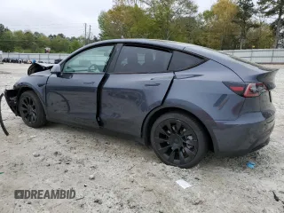 2021 Tesla Model Y Long Range z VIN 5YJYGDEE0MF254020, wystawiony jako Copart lot #51666865 z przebiegiem 25 805 mil mil oraz Szkody całkowita. Historia ofert i sprzedaży dostępna na DreamBid. Obrazek 2.