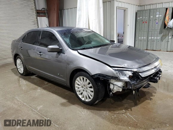 2010 Ford Fusion Hybrid with VIN 3FADP0L3XAR253417, listed as a Copart auction lot 60022345 with 123,315 mi miles and Salvage title. Bid and sale history available at DreamBid. Image 4.