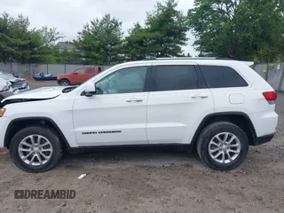 2021 Jeep Grand Cherokee Laredo E with VIN 1C4RJFAG7MC620710, listed as a IAAI auction lot 42255694 with 51,989 mi miles and . Bid and sale history available at DreamBid. Image 15.
