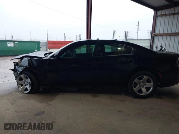 2021 Dodge Charger Police with VIN 2C3CDXAT5MH663136, listed as a IAAI auction lot 40348927 with 66,501 mi miles and . Bid and sale history available at DreamBid. Image 15.