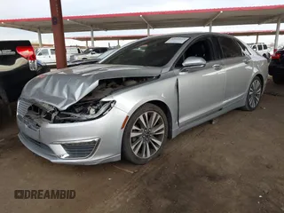 2017 Lincoln MKZ Reserve z VIN 3LN6L5E93HR603246, wystawiony jako IAAI lot #42024614 z przebiegiem 131 622 mil mil oraz . Historia ofert i sprzedaży dostępna na DreamBid. Obrazek 2.