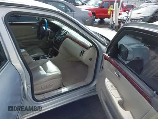 2006 Cadillac DTS w/1SC with VIN 1G6KD57Y56U101903, listed as a IAAI auction lot 41710160 with 151,057 mi miles. Bid and sale history available at carsss.com. Image 5.