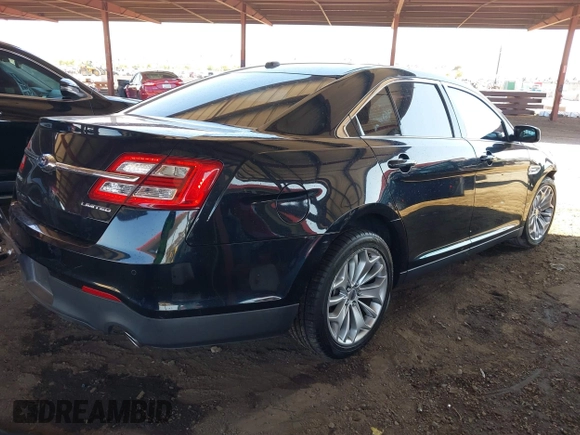 2015 Ford Taurus Limited with VIN 1FAHP2F8XFG135452, listed as a IAAI auction lot 42003510 with 71,476 mi miles. Bid and sale history available at carsss.com. Image 4.