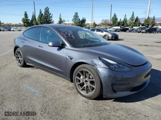 2021 Tesla Model 3 Standard Range Plus with VIN 5YJ3E1EA9MF872920, listed as a Copart auction lot 83625474 with 62,507 mi miles and Salvage Title. Bid and sale history available at carsss.com. Image 4.