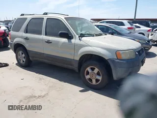 2003 Ford Escape XLS Popular with VIN 1FMYU02103KE20195, listed as a IAAI auction lot 41830663 with 262,580 mi miles. Bid and sale history available at carsss.com. Image 1.