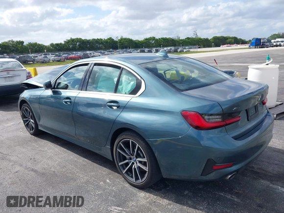 2020 BMW 3 Series 330i xDrive with VIN 3MW5R7J03L8B09157, listed as a IAAI auction lot 39168393 with 69,052 mi miles. Bid and sale history available at carsss.com. Image 3.