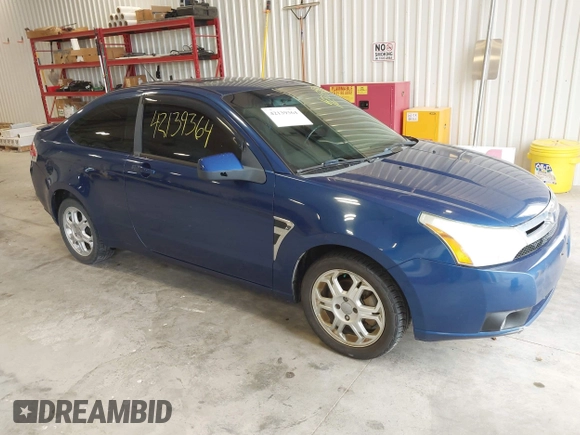 2008 Ford Focus SE with VIN 1FAHP33NX8W133127, listed as a IAAI auction lot 42139364 with 193,882 mi miles. Bid and sale history available at carsss.com. Image 1.