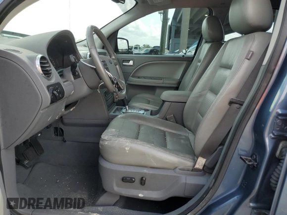 2005 Ford Freestyle SEL z VIN 1FMDK021X5GA25385, wystawiony jako Copart lot #72239954 z przebiegiem 161 219 mil mil oraz Szkoda całkowita • Salvage title. Historia ofert i sprzedaży dostępna na DreamBid. Obrazek 7.