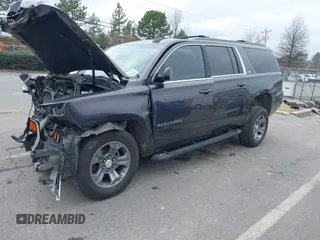 2017 Chevrolet Suburban LT z VIN 1GNSKHKC2HR315082, wystawiony jako IAAI lot #41545420 z przebiegiem 117 565 mil mil oraz . Historia ofert i sprzedaży dostępna na DreamBid. Obrazek 17.