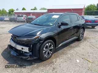 2024 Toyota bZ4X XLE with VIN JTMABACA7RA061457, listed as a IAAI auction lot 42395872 with 16,558 mi miles and . Bid and sale history available at DreamBid. Image 2.