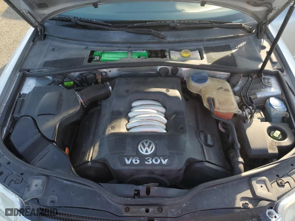 2004 Volkswagen Passat Sedan GLX with VIN WVWRH63B44P053071, listed as a Copart auction lot 49909905 with 211,273 mi miles and Salvage Title. Bid and sale history available at carsss.com. Image 11.