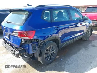 2023 Volkswagen Taos S z VIN 3VVDX7B24PM323173, wystawiony jako IAAI lot #41763607 z przebiegiem 38 506 mil mil oraz . Historia ofert i sprzedaży dostępna na DreamBid. Obrazek 4.