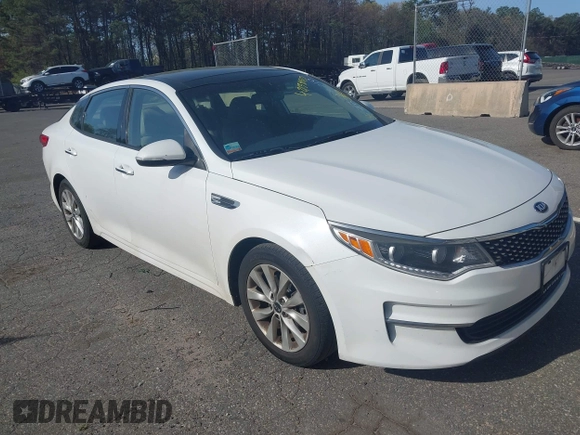 2016 Kia Optima EX with VIN 5XXGU4L32GG070138, listed as a IAAI auction lot 42138810 with 131,040 mi miles. Bid and sale history available at carsss.com. Image 1.