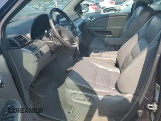 2010 Honda Odyssey EX-L z VIN 5FNRL3H73AB089714, wystawiony jako Copart lot #60276305 z przebiegiem 125 025 mil mil oraz Szkoda całkowita • Salvage title. Historia ofert i sprzedaży dostępna na DreamBid. Obrazek 7.