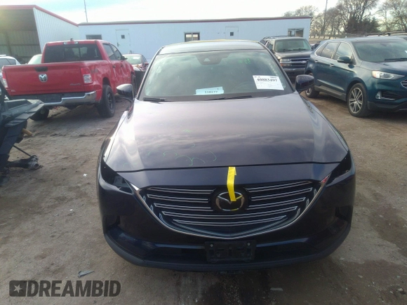 2021 Mazda CX-9 Sport with VIN JM3TCBBY4M0519407, listed as a IAAI auction lot 40883497 with 90,205 mi miles and . Bid and sale history available at carsss.com. Image 13.