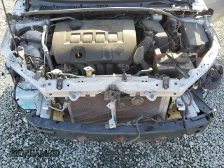 2019 Toyota Corolla L z VIN 5YFBURHE1KP922156, wystawiony jako Copart lot #51513865 z przebiegiem 211 756 mil mil oraz Szkoda całkowita • Salvage title. Historia ofert i sprzedaży dostępna na DreamBid. Obrazek 11.
