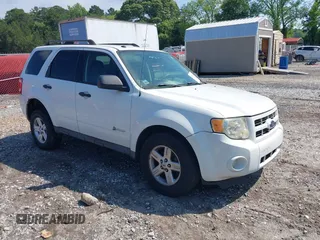 2010 Ford Escape Hybrid z VIN 1FMCU5K32AKA85902, wystawiony jako IAAI lot #42230784 z przebiegiem 212 358 mil mil oraz . Historia ofert i sprzedaży dostępna na DreamBid. Obrazek 1.