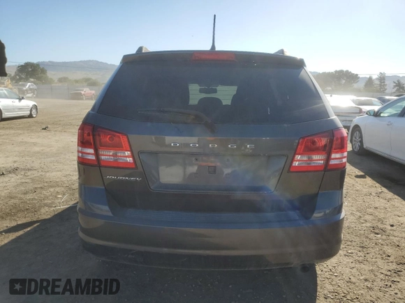 2016 Dodge Journey SE with VIN 3C4PDCABXGT103296, listed as a Copart auction lot 56358715 with 106,821 mi miles and Clean Title. Bid and sale history available at DreamBid. Image 6.
