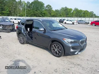 2020 BMW X1 xDrive28i with VIN WBXJG9C08L5R71788, listed as a IAAI auction lot 42604792 with 46,489 mi miles and . Bid and sale history available at DreamBid. Image 1.