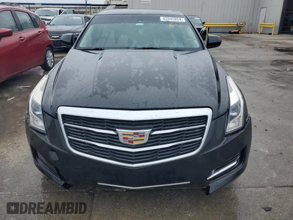 2015 Cadillac ATS Standard RWD z VIN 1G6AA5RA9F0143521, wystawiony jako Copart lot #82045854 z przebiegiem 106 089 mil mil oraz Szkoda całkowita • Salvage title. Historia ofert i sprzedaży dostępna na DreamBid. Obrazek 5.