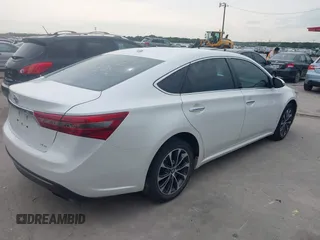 2016 Toyota Avalon Limited z VIN 4T1BK1EB7GU235304, wystawiony jako IAAI lot #42443795 z przebiegiem 197 261 mil mil oraz . Historia ofert i sprzedaży dostępna na DreamBid. Obrazek 4.