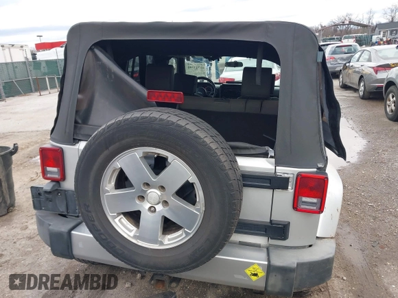 2008 Jeep Wrangler Unlimited Sahara with VIN 1J4GA59158L501099, listed as a IAAI auction lot 41743590 with 213,941 mi miles and . Bid and sale history available at DreamBid. Image 16.
