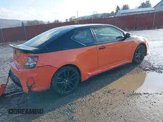 2015 Scion tC with VIN JTKJF5C77FJ008276, listed as a IAAI auction lot 41679236 with 90,987 mi miles. Bid and sale history available at carsss.com. Image 4.