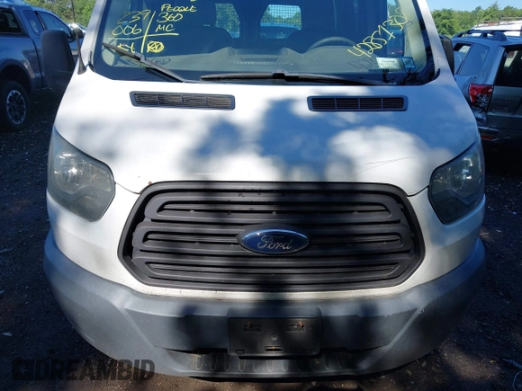 2016 Ford Transit Cargo with VIN 1FTYR1ZM2GKB06257, listed as a IAAI auction lot 42851308 with 239,006 mi miles and . Bid and sale history available at DreamBid. Image 6.