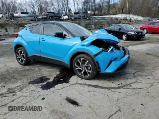 2019 Toyota C-HR XLE with VIN NMTKHMBX4KR097964, listed as a Copart auction lot 50431145 with 0 mi miles and Salvage Title. Bid and sale history available at carsss.com. Image 12.