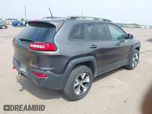 2016 Jeep Cherokee Trailhawk z VIN 1C4PJMBS1GW323434, wystawiony jako IAAI lot #42485364 z przebiegiem 130 351 mil mil oraz . Historia ofert i sprzedaży dostępna na DreamBid. Obrazek 4.