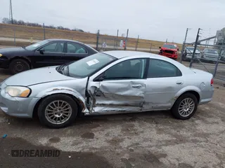 2004 Chrysler Sebring Touring z VIN 1C3EL56R74N392214, wystawiony jako IAAI lot #41510245 z przebiegiem 159 751 mil mil oraz . Historia ofert i sprzedaży dostępna na DreamBid. Obrazek 14.