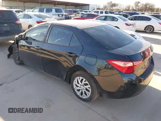 2019 Toyota Corolla L with VIN 5YFBURHE0KP912699, listed as a IAAI auction lot 41734931 with 22,686 mi miles and . Bid and sale history available at carsss.com. Image 3.