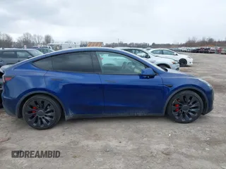 2020 Tesla Model Y Long Range with VIN 5YJYGDEF0LF000380, listed as a IAAI auction lot 41867489 with 66,294 mi miles and . Bid and sale history available at DreamBid. Image 13.