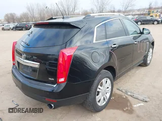 2015 Cadillac SRX Luxury Collection with VIN 3GYFNEE36FS508495, listed as a IAAI auction lot 41133746 with 167,272 mi miles. Bid and sale history available at carsss.com. Image 4.