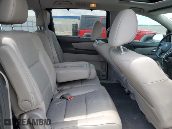 2016 Honda Odyssey EX-L z VIN 5FNRL5H65GB017067, wystawiony jako Copart lot #58424235 z przebiegiem 89 988 mil mil oraz Szkoda całkowita • Salvage title. Historia ofert i sprzedaży dostępna na DreamBid. Obrazek 11.