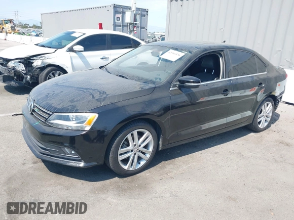 2015 Volkswagen Jetta SEL z VIN 3VWL17AJ7FM307632, wystawiony jako IAAI lot #42766536 z przebiegiem 101 661 mil mil oraz . Historia ofert i sprzedaży dostępna na DreamBid. Obrazek 2.