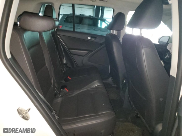2013 Volkswagen Tiguan SE w/Sunroof & Nav with VIN WVGBV3AX8DW609813, listed as a Copart auction lot 66888774 with 90,203 mi miles and Salvage Title. Bid and sale history available at carsss.com. Image 12.