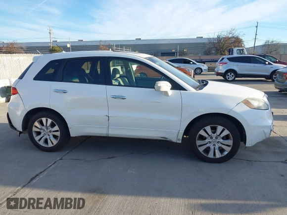 2012 Acura RDX Tech Pkg with VIN 5J8TB2H55CA000305, listed as a IAAI auction lot 41293627 with 209,566 mi miles. Bid and sale history available at carsss.com. Image 13.