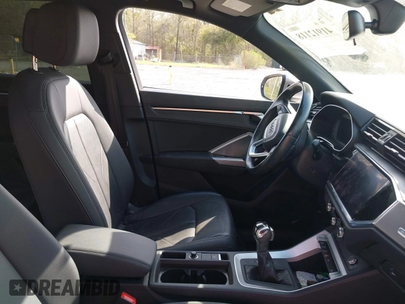 2020 Audi Q3 Premium with VIN WA1AECF36L1057823, listed as a IAAI auction lot 41912118 with 71,004 mi miles and . Bid and sale history available at DreamBid. Image 5.