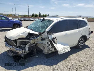 2017 Honda Pilot Touring with VIN 5FNYF5H96HB025743, listed as a Copart auction lot 58247675 with Not provided miles and Salvage title. Bid and sale history available at DreamBid. Image 1.
