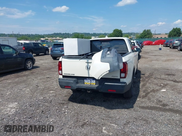 2019 Honda Ridgeline RTL-E with VIN 5FPYK3F71KB017906, listed as a IAAI auction lot 42670476 with 58,288 mi miles and . Bid and sale history available at DreamBid. Image 4.