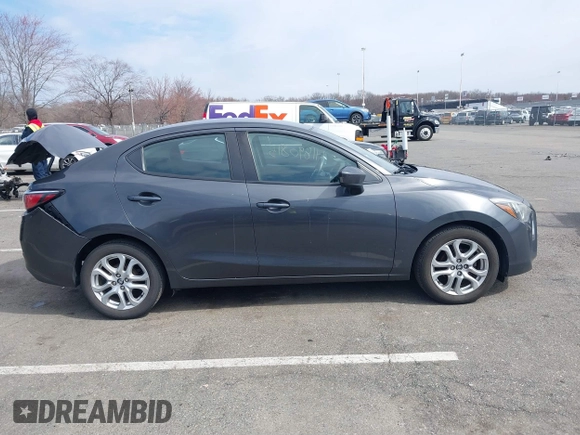 2018 Toyota Yaris with VIN 3MYDLBYV2JY321213, listed as a IAAI auction lot 41890815 with 94,089 mi miles and . Bid and sale history available at DreamBid. Image 13.