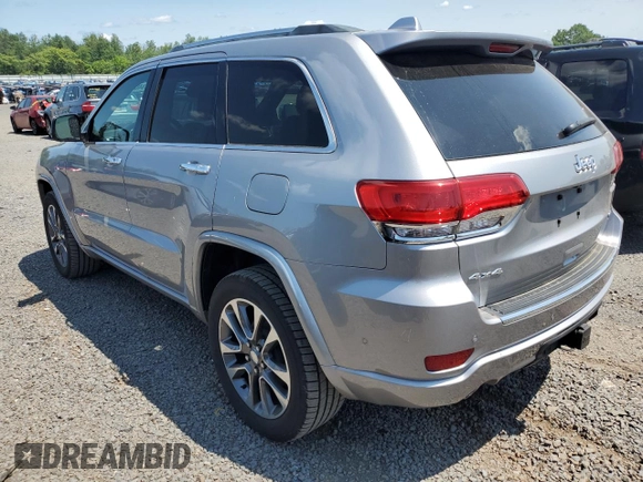 2018 Jeep Grand Cherokee Overland with VIN 1C4RJFCG2JC212947, listed as a Copart auction lot 59503405 with 76,436 mi miles and Clean title. Bid and sale history available at DreamBid. Image 2.