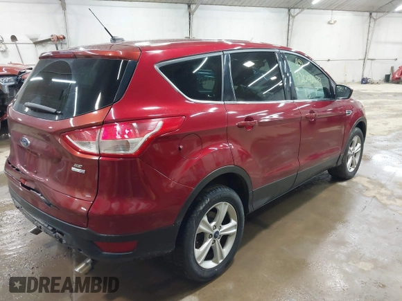 2013 Ford Escape SE with VIN 1FMCU9GX1DUC56361, listed as a IAAI auction lot 42042233 with 136,441 mi miles and . Bid and sale history available at DreamBid. Image 4.