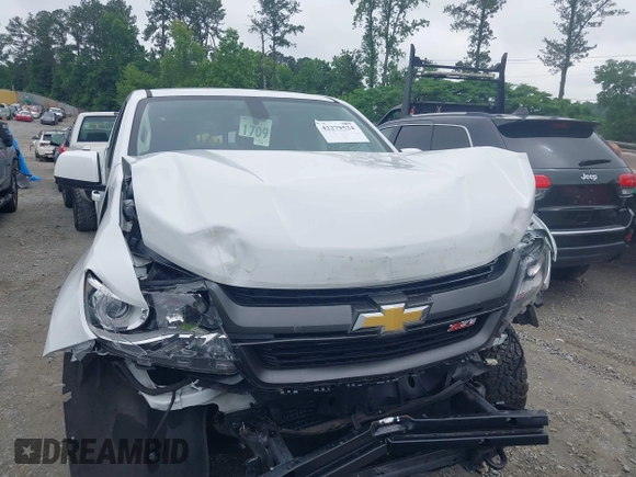 2020 Chevrolet Colorado 4WD Z71 with VIN 1GCGTDEN8L1238033, listed as a IAAI auction lot 42279524 with 22,164 mi miles and . Bid and sale history available at DreamBid. Image 12.