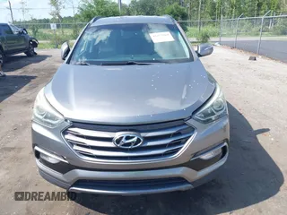 2017 Hyundai Santa Fe 2.4L z VIN 5NMZU3LB7HH025791, wystawiony jako IAAI lot #42277964 z przebiegiem 154 110 mil mil oraz . Historia ofert i sprzedaży dostępna na DreamBid. Obrazek 12.