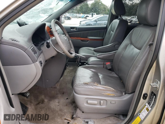 2009 Toyota Sienna XLE with VIN 5TDBK22C89S027706, listed as a Copart auction lot 88672015 with 215,515 mi miles and Salvage Title. Bid and sale history available at DreamBid. Image 7.